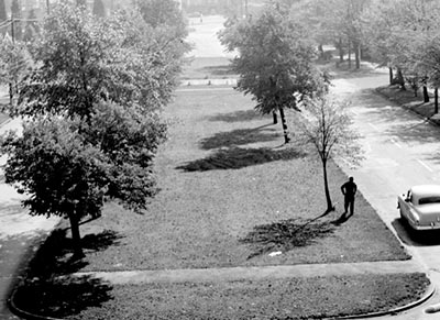 Montlake Boulevard, looking south, 1951 after streetcar tracks were removed from median.